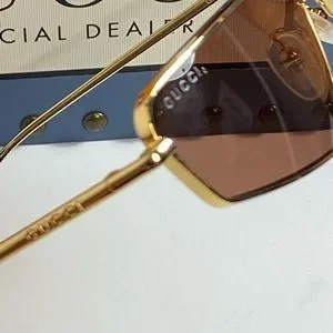 Gucci | Accessories | Gucci Womens Gold Gold Red Cat Eye  display picture 1